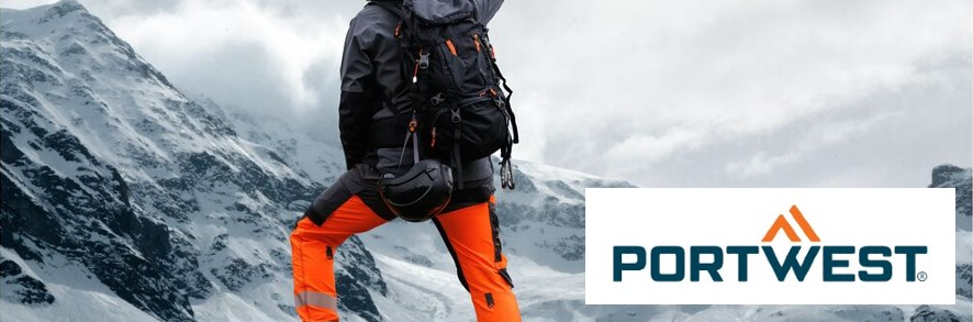 Back view of a person in orange work trousers and a functional jacket with a backpack on their back. In the background you can see a snowy mountain backdrop and in the bottom right of the picture is the logo of the manufacturer Portwest in blue and orange on a white background.