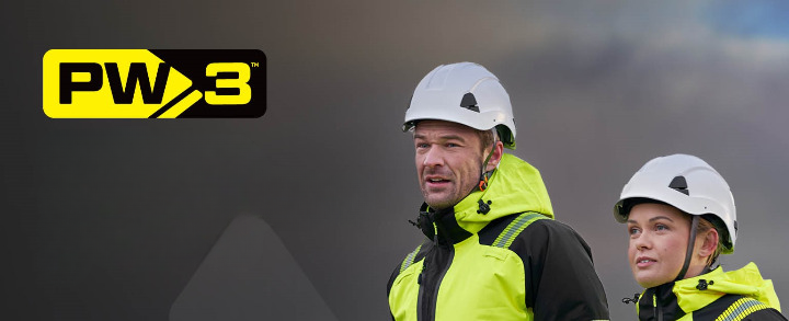 A man and woman wearing high visibility yellow PW3™ workwear. Both wear white hard hats, black gloves and yellow jacket and trousers with reflective strips. The background is grey with the Portwest logo in light grey. The PW3 collection logo is at the top left of the image.