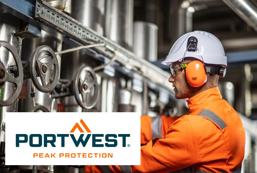 Image of a worker dressed in orange with a white hard hat and orange PS47 clip-on hearing protection. It is in front of a wall with stainless steel tanks and rotary valves. A link to our hearing protection is provided